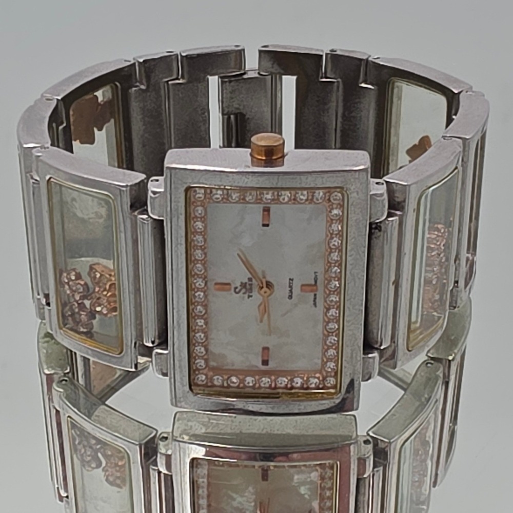 SK Time Cuff Watch Womens OS Silver Good Floating Charms Crystal Bezel 3006